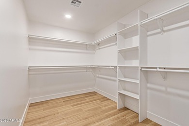 E X Q U I S I T E Golf Course Residence. Inside, you'll find a