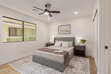 E X Q U I S I T E Golf Course Residence. Inside, you'll find a