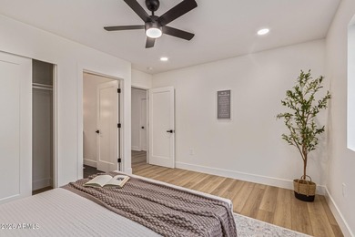 E X Q U I S I T E Golf Course Residence. Inside, you'll find a