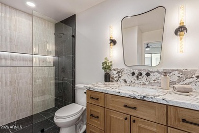 E X Q U I S I T E Golf Course Residence. Inside, you'll find a