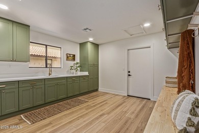 E X Q U I S I T E Golf Course Residence. Inside, you'll find a