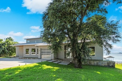 This is the lake house everyone has been waiting for. Positioned - photo 35