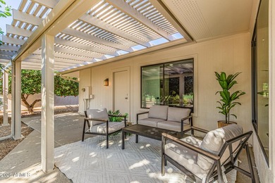 E X Q U I S I T E Golf Course Residence. Inside, you'll find a