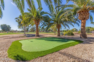 E X Q U I S I T E Golf Course Residence. Inside, you'll find a