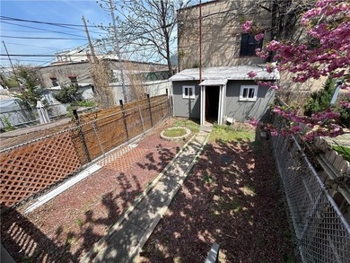 Welcome home to this elegant three-level two family brick home - photo 29