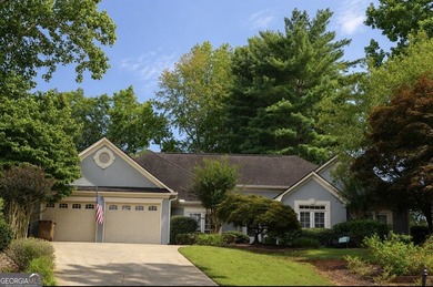 Welcome home to this charming one-level ranch nestled in the - photo 1