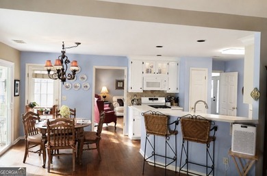 Welcome home to this charming one-level ranch nestled in the - photo 4