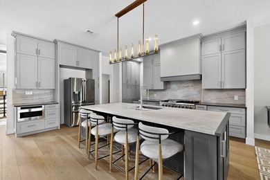 Stunning Luxury Lakefront Living in Cedar Creek Edge Water - photo 6
