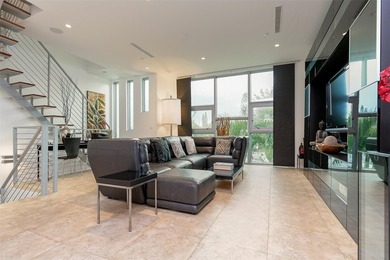 RARELY AVAILABLE!! Located steps to ocean, this contemporary