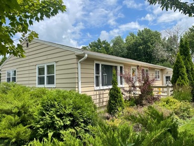 This inviting 4-bedroom, 2 bath home offers a bright layout with - photo 1