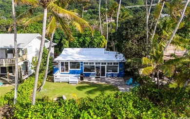 Set directly on the sand at world-famous Sunset Beach, this - photo 3