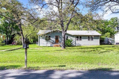 Renovated & move-in ready! This 4-bedroom, 2-bathroom home is - Lake Home For Sale in Gun Barrel City, Texas