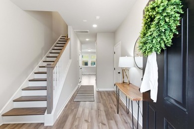TRULY TURN-KEY! This 2023 end-unit townhome by Ashton Woods is - photo 8
