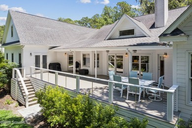 Nestled beneath a mature oak tree and surrounded by established - photo 22