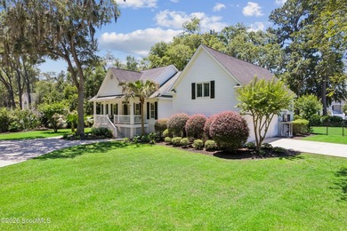 Nestled beneath a mature oak tree and surrounded by established - photo 23