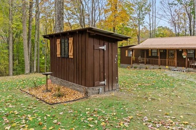 Delightful cabin style cottage on 6.60 surveyed beautiful - photo 25