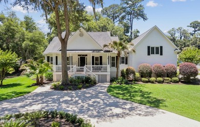 Nestled beneath a mature oak tree and surrounded by established - photo 35