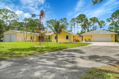 (private lake, pond, creek) Home For Sale in The Acreage Florida