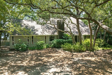 Positioned on a private one-acre homesite with 130 feet of deep - photo 7