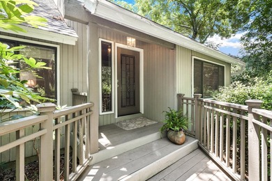 Positioned on a private one-acre homesite with 130 feet of deep - photo 8