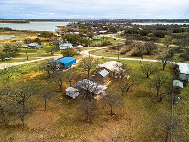 Waterfront retreat on sought-after Tanglewood Island, spanning - photo 8