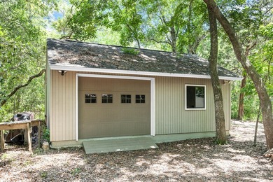 Positioned on a private one-acre homesite with 130 feet of deep - photo 9