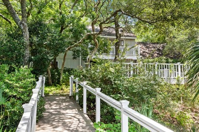 Positioned on a private one-acre homesite with 130 feet of deep - photo 10