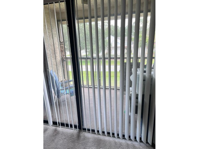 Welcome to this inviting second-floor condo located in the - photo 13