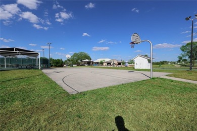Welcome to this inviting second-floor condo located in the - photo 51