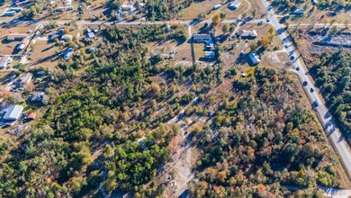 This large, vacant land parcel is a dream at 7.15 ACRES! Zoning - photo 6