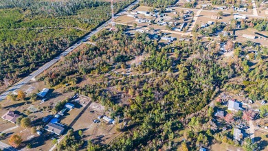 This large, vacant land parcel is a dream at 7.15 ACRES! Zoning - photo 9