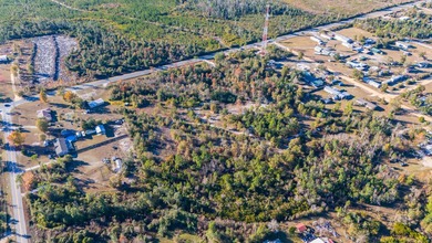 This large, vacant land parcel is a dream at 7.15 ACRES! Zoning - photo 10