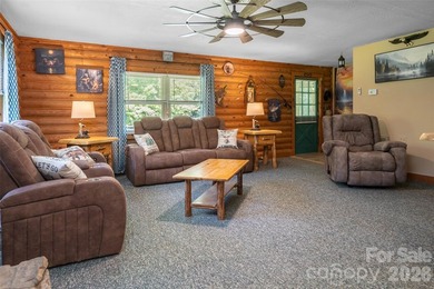 Escape to the mountains in this custom log cabin located in the - photo 7