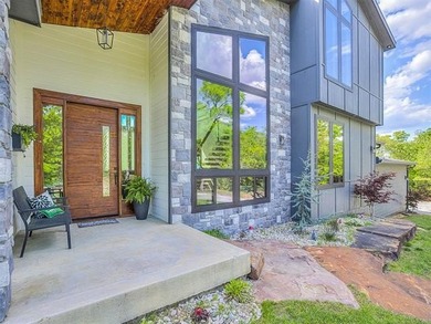 PANORAMIC LAKE VIEWS + TRUE LAKE LIFE LIVING! Discover elevated - photo 6