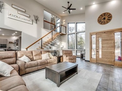 PANORAMIC LAKE VIEWS + TRUE LAKE LIFE LIVING! Discover elevated - photo 8