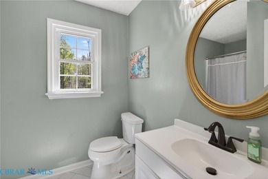 Discover effortless living in Urbanna Creek Farms with this - photo 29