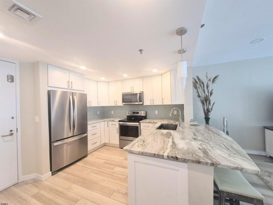 Experience coastal living at its finest in magnificently updated