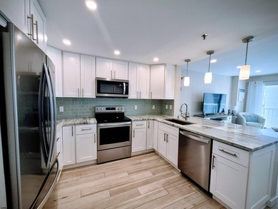 Experience coastal living at its finest in magnificently updated