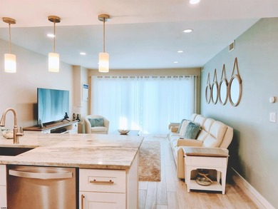 Experience coastal living at its finest in magnificently updated