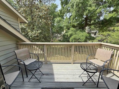 Updated and attractive second-floor end-unit villa featuring two - photo 11
