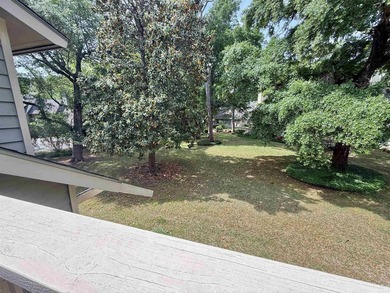 Updated and attractive second-floor end-unit villa featuring two - photo 12