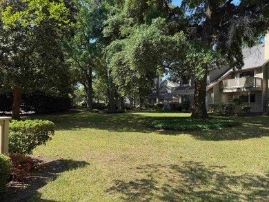 Updated and attractive second-floor end-unit villa featuring two - photo 14