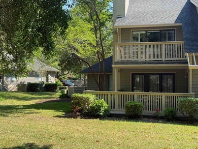 Updated and attractive second-floor end-unit villa featuring two - photo 15