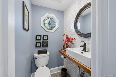 The brick driveway and lovely porch welcome you to this turnkey - photo 17
