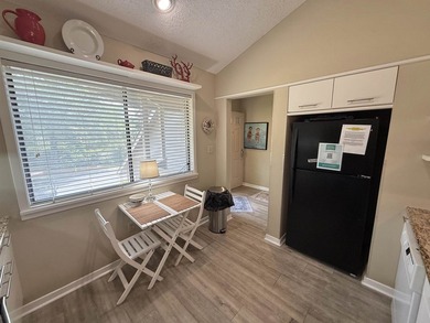 Updated and attractive second-floor end-unit villa featuring two - photo 26