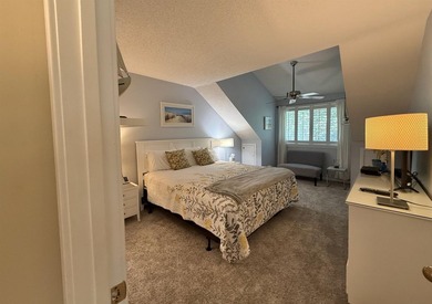 Updated and attractive second-floor end-unit villa featuring two - photo 27