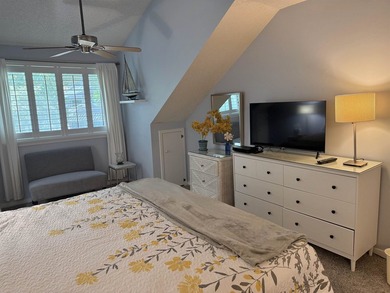 Updated and attractive second-floor end-unit villa featuring two - photo 30