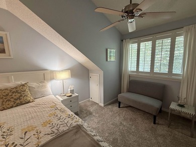 Updated and attractive second-floor end-unit villa featuring two - photo 32