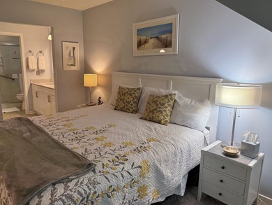 Updated and attractive second-floor end-unit villa featuring two - photo 34