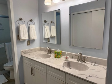 Updated and attractive second-floor end-unit villa featuring two - photo 35